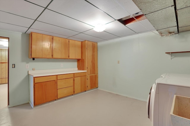 2651 E 35th Ave, Spokane, WA 99223 - laundry area with cabinet space, washing machine and dryer, and baseboards
