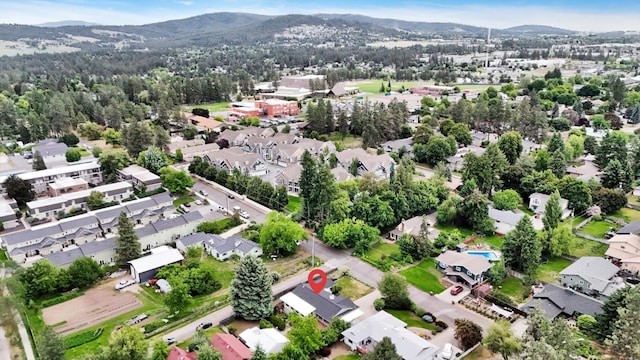 2651 E 35th Ave, Spokane, WA 99223 - aerial overview of property's location featuring mountains and nearby suburban area