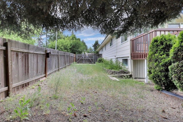 2651 E 35th Ave, Spokane, WA 99223 - fenced backyard with a deck