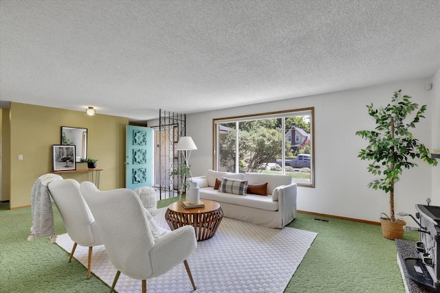 2651 E 35th Ave, Spokane, WA 99223 - living room with carpet, a textured ceiling, and baseboards