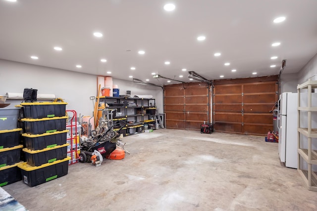 3617 N Edgerton Rd, Spokane Valley, WA 99212 - garage featuring freestanding refrigerator and recessed lighting