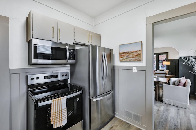 613 W Kiernan Ave, Spokane, WA 99205 - kitchen featuring appliances with stainless steel finishes and light wood-style flooring