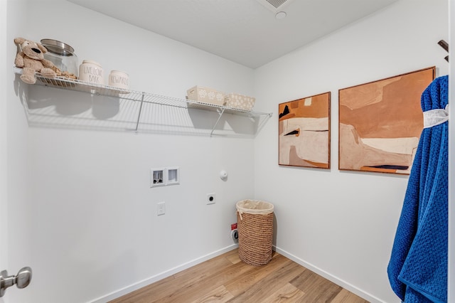16359 E 30th Ln, Spokane Valley, WA 99037 - washroom featuring electric dryer hookup, hookup for a washing machine, wood finished floors, baseboards, and gas dryer hookup