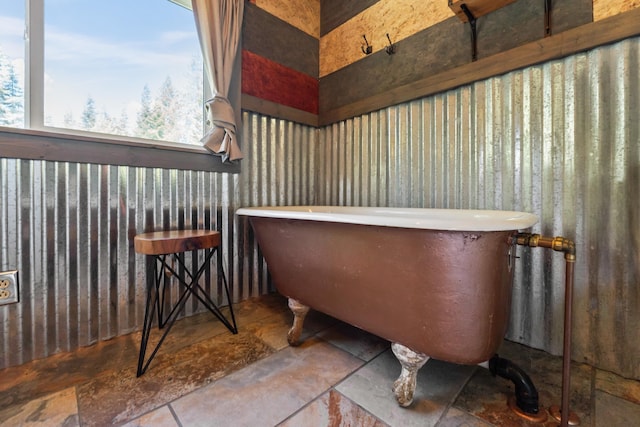 1100 Graham Rd, Cusick, WA 99119 - full bathroom with a freestanding bath, stone finish flooring, and healthy amount of natural light