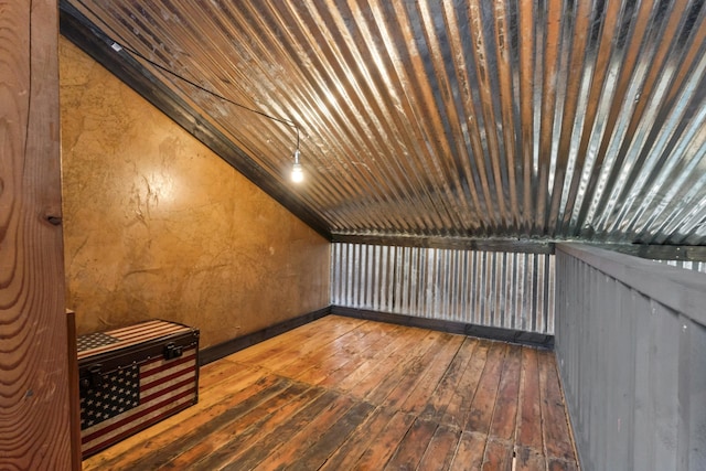 1100 Graham Rd, Cusick, WA 99119 - additional living space with hardwood / wood-style floors, lofted ceiling, and baseboards