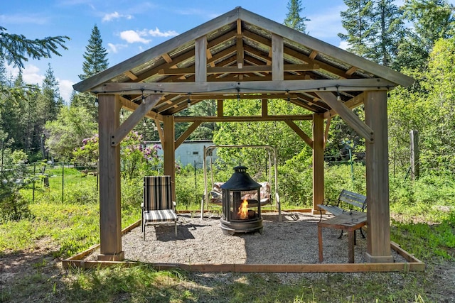 1100 Graham Rd, Cusick, WA 99119 - surrounding community with an outdoor fire pit and a gazebo