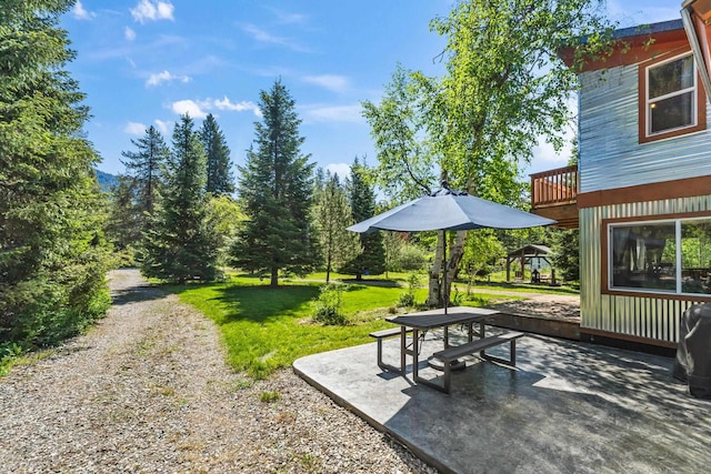 1100 Graham Rd, Cusick, WA 99119 - view of grassy yard featuring a patio and outdoor dining area