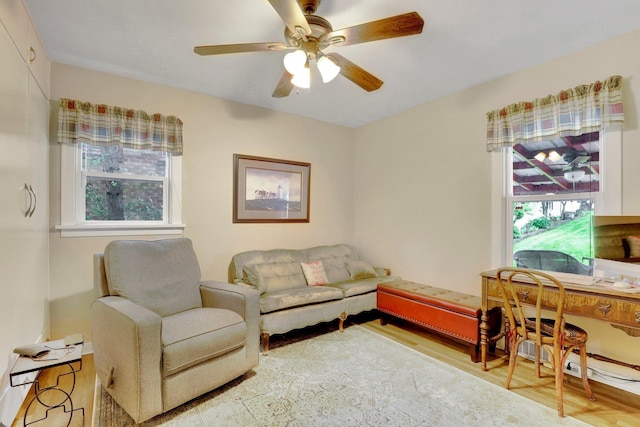 1211 W 17th Ave, Spokane, WA 99203 - living room featuring a ceiling fan and wood finished floors