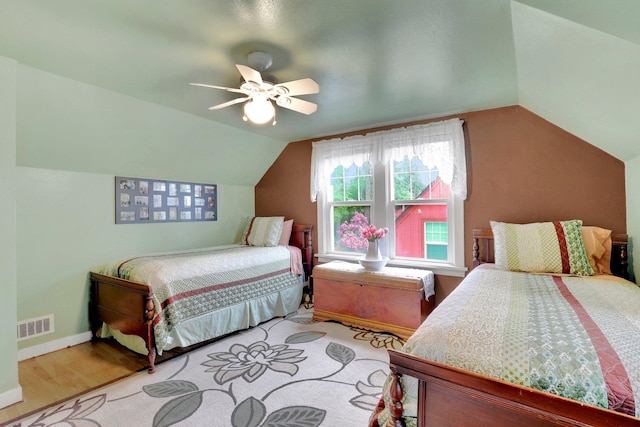 1211 W 17th Ave, Spokane, WA 99203 - bedroom featuring lofted ceiling, ceiling fan, wood finished floors, and baseboards
