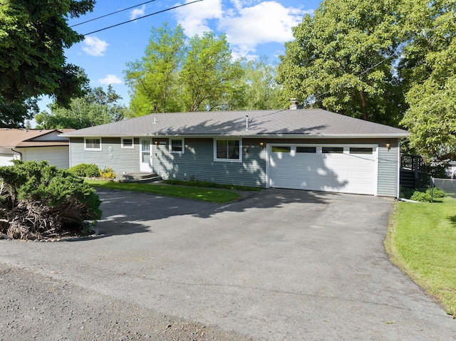 11132 S Silver Lake Rd, Medical Lake, WA 99022 - ranch-style house with driveway and a garage