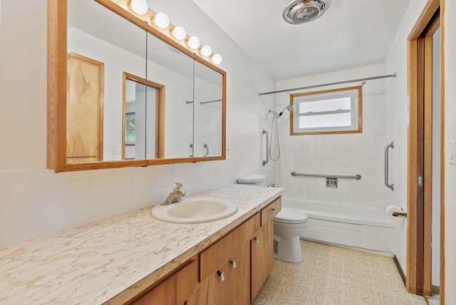 11132 S Silver Lake Rd, Medical Lake, WA 99022 - full bathroom with washtub / shower combination, vanity, toilet, and tasteful backsplash