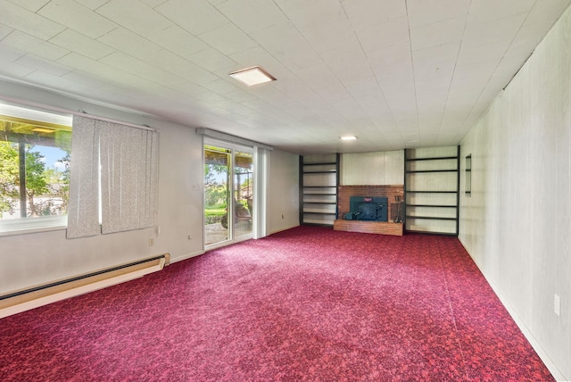 11132 S Silver Lake Rd, Medical Lake, WA 99022 - unfurnished living room featuring a fireplace, plenty of natural light, and carpet