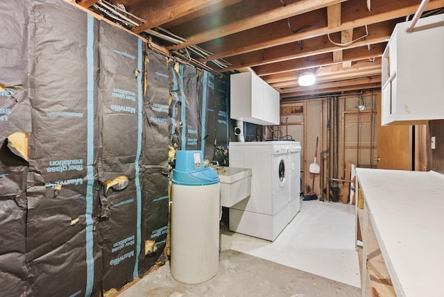 11132 S Silver Lake Rd, Medical Lake, WA 99022 - unfinished below grade area featuring washer and dryer, a water softener, and a sink