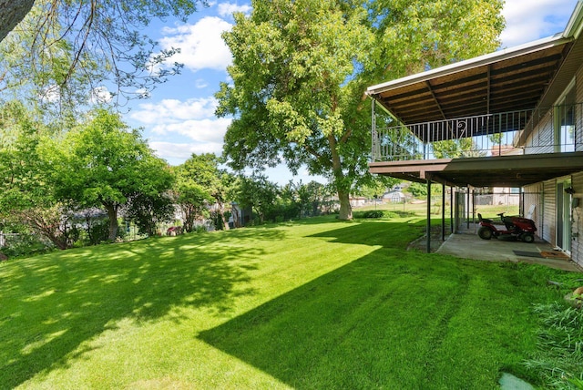 11132 S Silver Lake Rd, Medical Lake, WA 99022 - view of grassy yard with a deck
