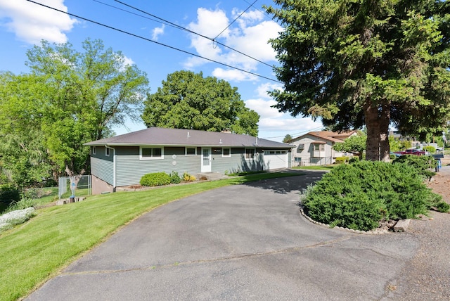 11132 S Silver Lake Rd, Medical Lake, WA 99022 - single story home with asphalt driveway and a front lawn