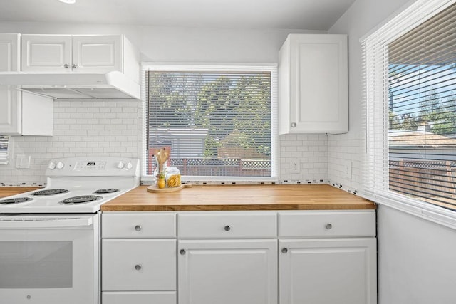 3129 E 34th Ave, Spokane, WA 99223 - kitchen featuring white electric range, butcher block counters, range hood, tasteful backsplash, and white cabinets