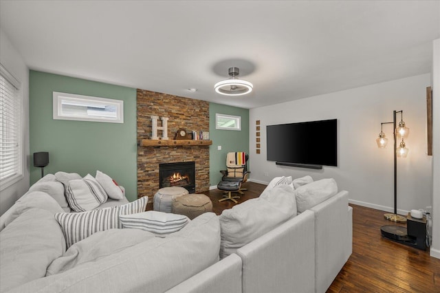 6730 S Moran View St, Spokane, WA 99224 - living area with plenty of natural light, dark wood-style flooring, baseboards, and a fireplace