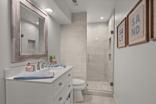 6730 S Moran View St, Spokane, WA 99224 - bathroom featuring vanity, toilet, a stall shower, and recessed lighting