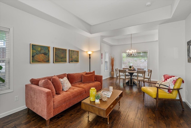 6730 S Moran View St, Spokane, WA 99224 - living area with a tray ceiling, baseboards, a chandelier, and plenty of natural light