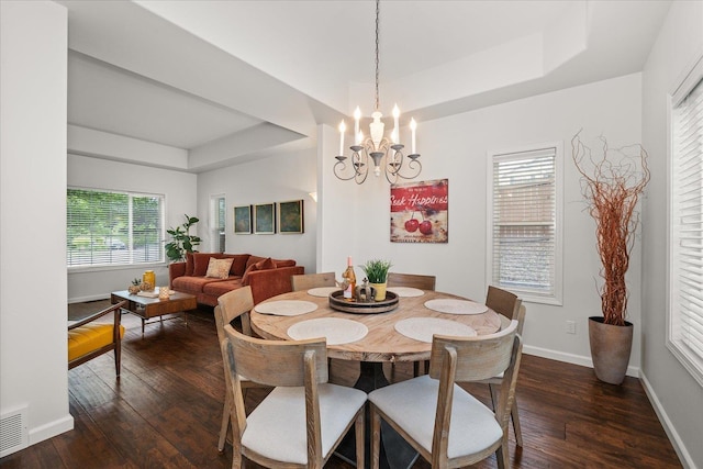 6730 S Moran View St, Spokane, WA 99224 - dining space featuring a raised ceiling, dark wood finished floors, a chandelier, and baseboards