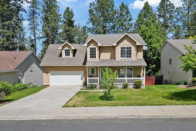 4227 E 38th Ave, Spokane, WA 99223 - traditional home with stucco siding, covered porch, an attached garage, and concrete driveway