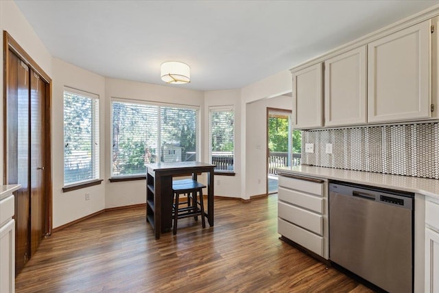 4227 E 38th Ave, Spokane, WA 99223 - kitchen featuring dishwasher, tasteful backsplash, dark wood-style floors, light countertops, and baseboards