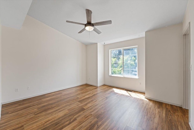 4227 E 38th Ave, Spokane, WA 99223 - unfurnished room featuring wood finished floors, ceiling fan, and baseboards