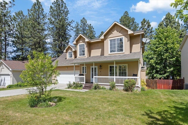 4227 E 38th Ave, Spokane, WA 99223 - traditional home with a porch, stucco siding, a garage, concrete driveway, and roof with shingles