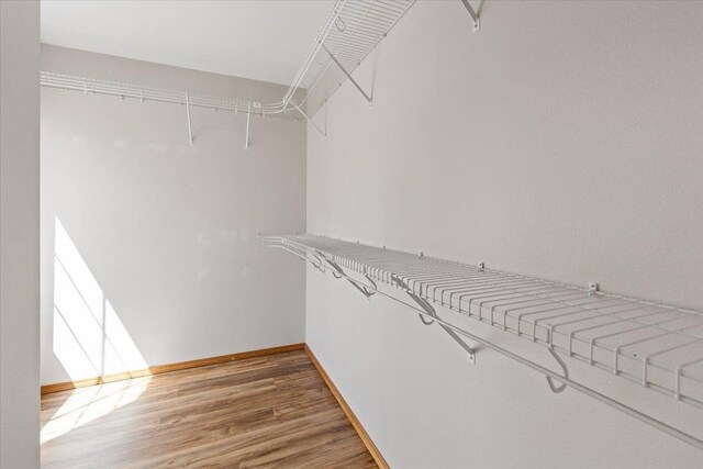 4227 E 38th Ave, Spokane, WA 99223 - walk in closet with wood finished floors