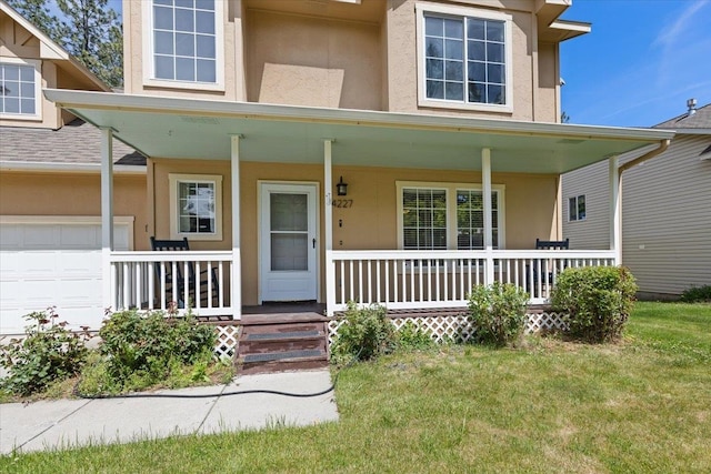 4227 E 38th Ave, Spokane, WA 99223 - view of front facade with stucco siding, covered porch, and a front yard