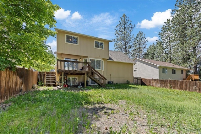 4227 E 38th Ave, Spokane, WA 99223 - back of house featuring stairway, a wooden deck, and a fenced backyard