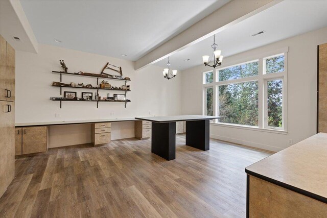 223 N Lindeblad Ln, Liberty Lake, WA 99019 - kitchen featuring wood finished floors, a chandelier, baseboards, beamed ceiling, and hanging light fixtures