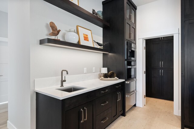 13858 N Boulder Park Ln, Spokane, WA 99208 - kitchen with open shelves, a sink, dark cabinetry, light countertops, and black oven