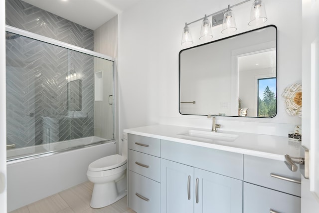 13858 N Boulder Park Ln, Spokane, WA 99208 - bathroom with vanity, toilet, and combined bath / shower with glass door