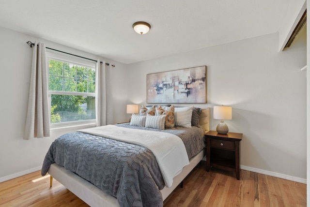 814 N Mamer Rd, Spokane Valley, WA 99216 - bedroom with baseboards and wood finished floors