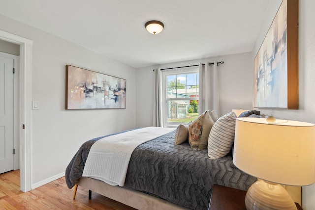 814 N Mamer Rd, Spokane Valley, WA 99216 - bedroom featuring wood finished floors and baseboards