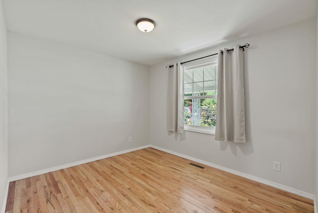 814 N Mamer Rd, Spokane Valley, WA 99216 - unfurnished room featuring wood finished floors and baseboards