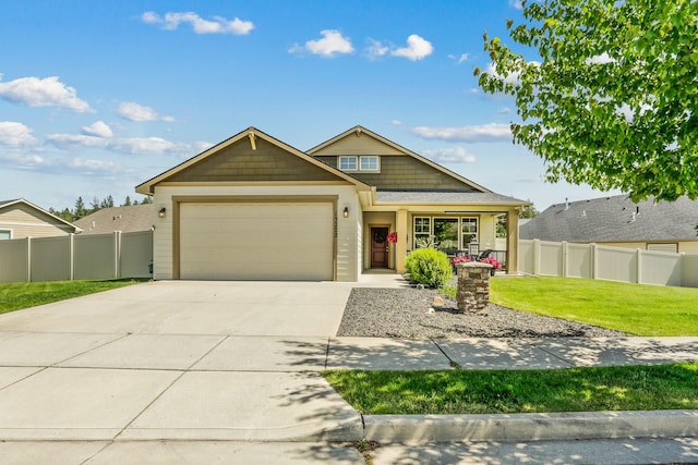 13202 N Addison St, Spokane, WA 99208 - view of front of house featuring an attached garage and driveway