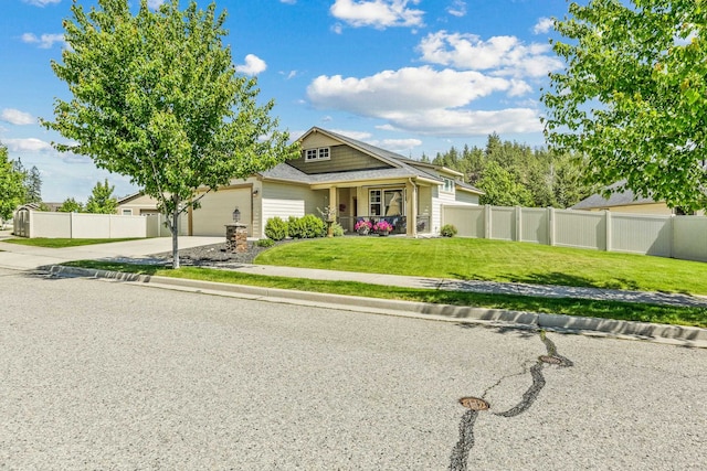 13202 N Addison St, Spokane, WA 99208 - view of front of property with a garage, concrete driveway, and a porch