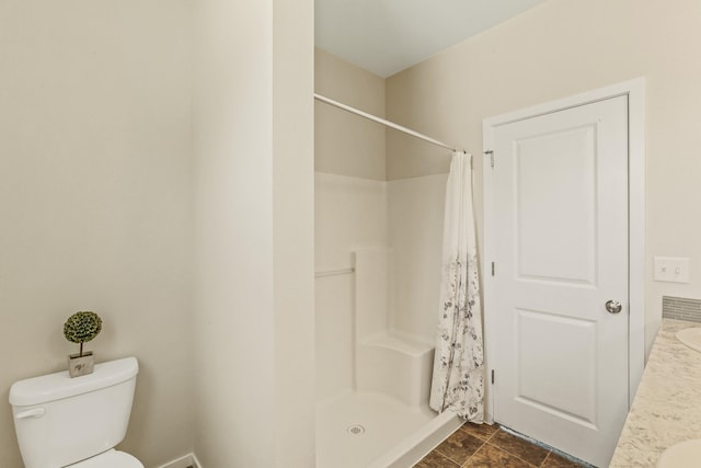13202 N Addison St, Spokane, WA 99208 - full bathroom with a stall shower, toilet, and vanity