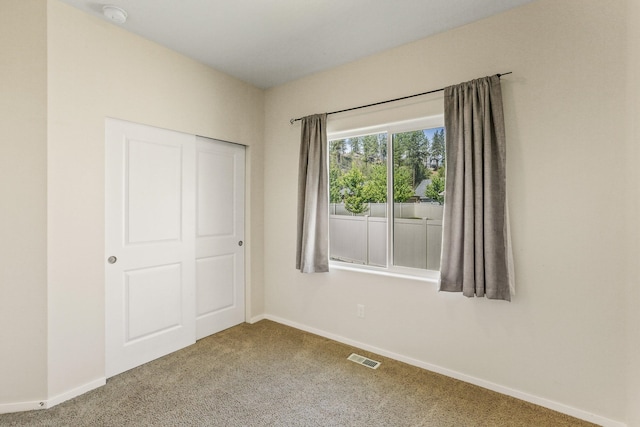 13202 N Addison St, Spokane, WA 99208 - unfurnished bedroom featuring carpet and baseboards