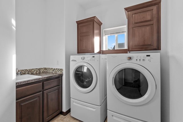 3260 W Magistrate Loop, Hayden, ID 83835 - laundry room with cabinet space and washing machine and dryer