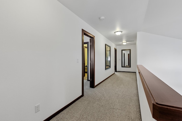 3260 W Magistrate Loop, Hayden, ID 83835 - corridor featuring light colored carpet and baseboards