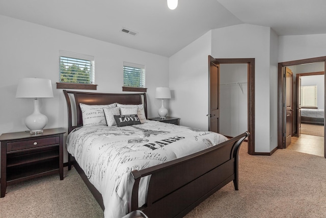 3260 W Magistrate Loop, Hayden, ID 83835 - bedroom featuring carpet floors, a closet, a spacious closet, vaulted ceiling, and baseboards