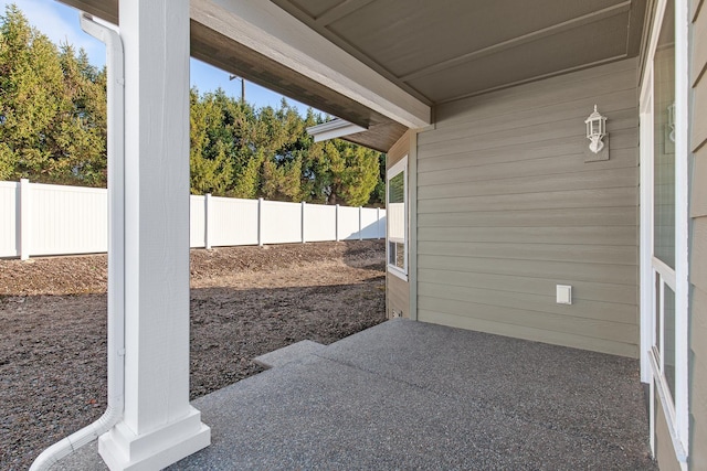 3260 W Magistrate Loop, Hayden, ID 83835 - fenced backyard with a patio
