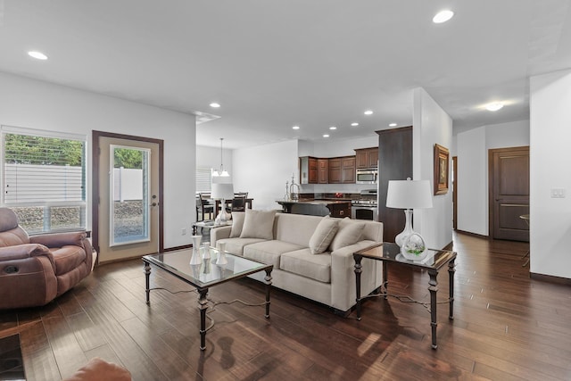 3260 W Magistrate Loop, Hayden, ID 83835 - living room with dark wood-style flooring, recessed lighting, and baseboards