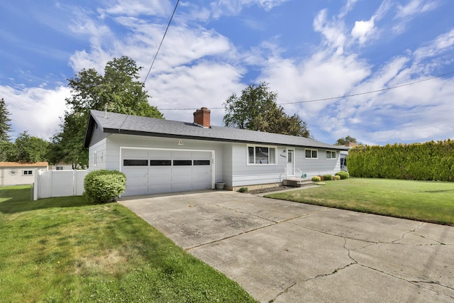 11307 E 8th Ave, Spokane Valley, WA 99206 - single story home with a garage, concrete driveway, and a chimney