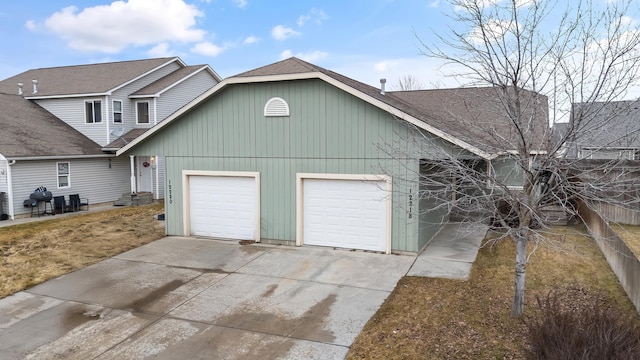 12218 W 10th Ave, Airway Heights, WA 99001 - view of front of property with a garage, roof with shingles, concrete driveway, and a front lawn