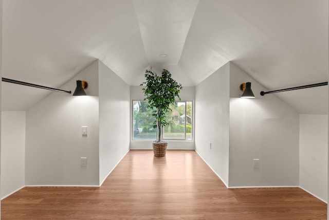2018 E 6th Ave, Spokane, WA 99202 - bonus room with vaulted ceiling, wood finished floors, and baseboards