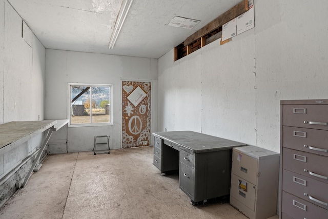 1306 Peachcrest Rd, Kettle Falls, WA 99141 - unfurnished office featuring unfinished concrete flooring